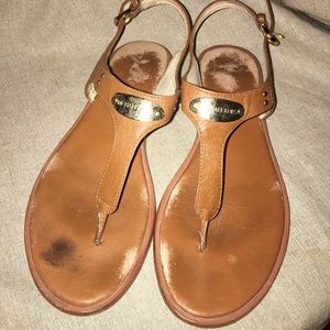 MK plate flat thong sandals
